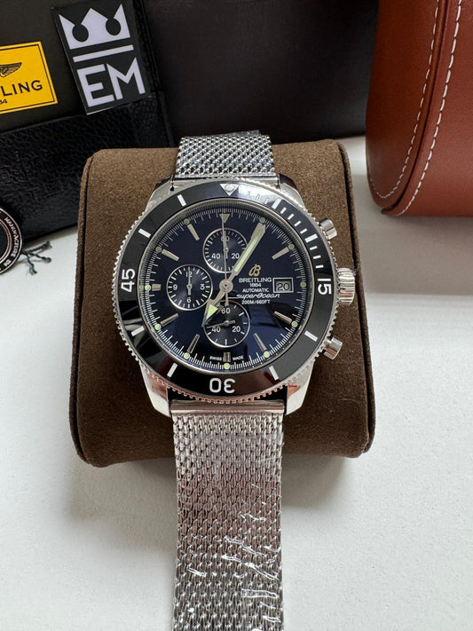 https://images.tcdn.com.br/img/img_prod/1346550/breitling_superocean_567_1_f1eee4e57546203dc6ea020aa6b911bf.jpeg