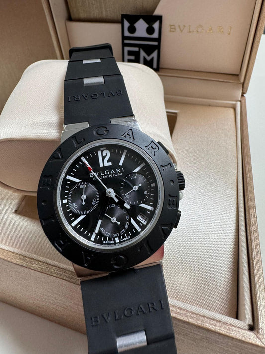 https://images.tcdn.com.br/img/img_prod/1346550/bvlgari_aluminium_709_1_06d633dd8ab19a32178b846e75558395.jpeg